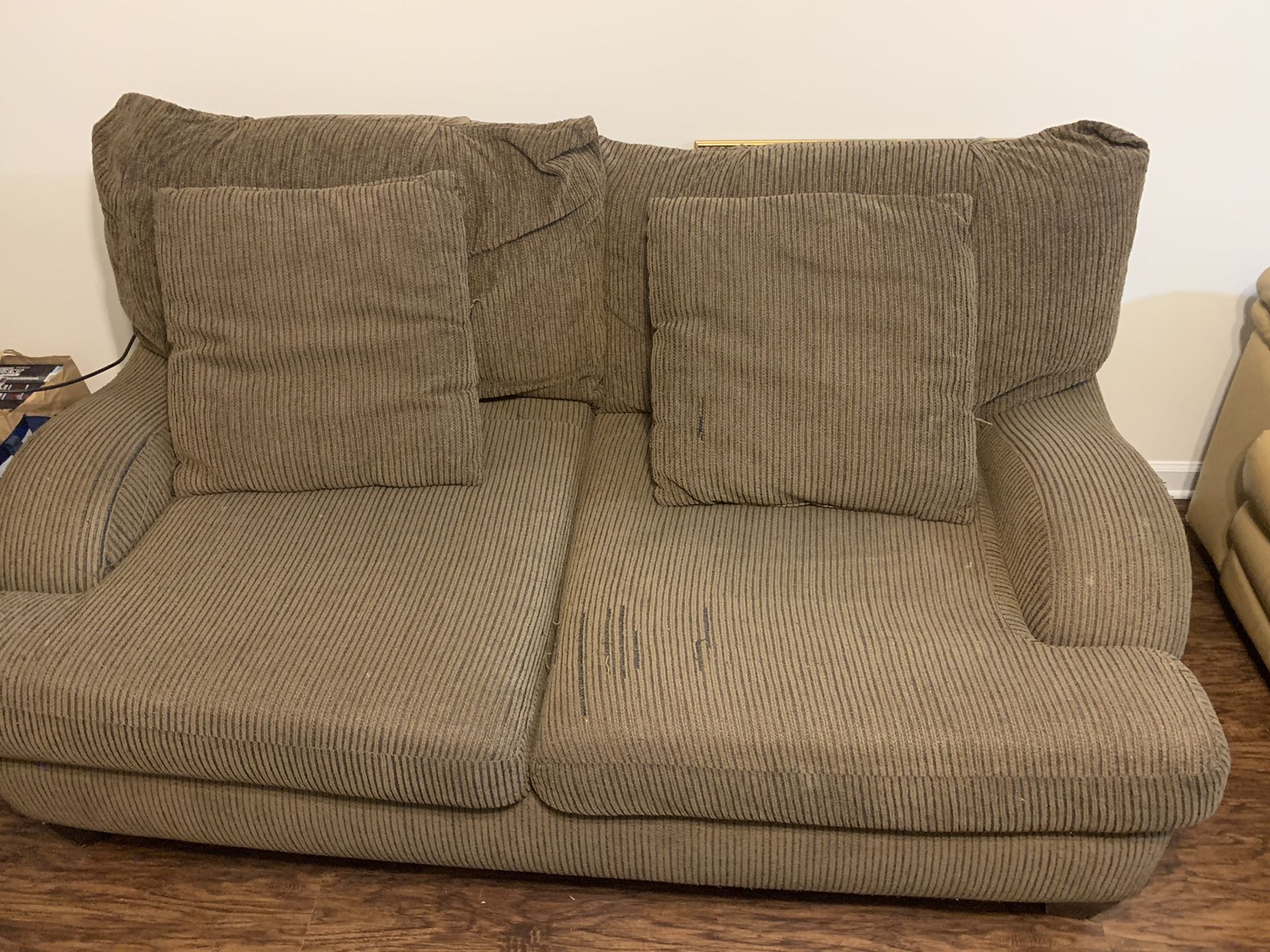 Brown loveseat