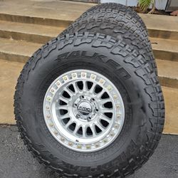 17" KMC  rims w- 33" FALKEN WILDPEAK AT3 tires 