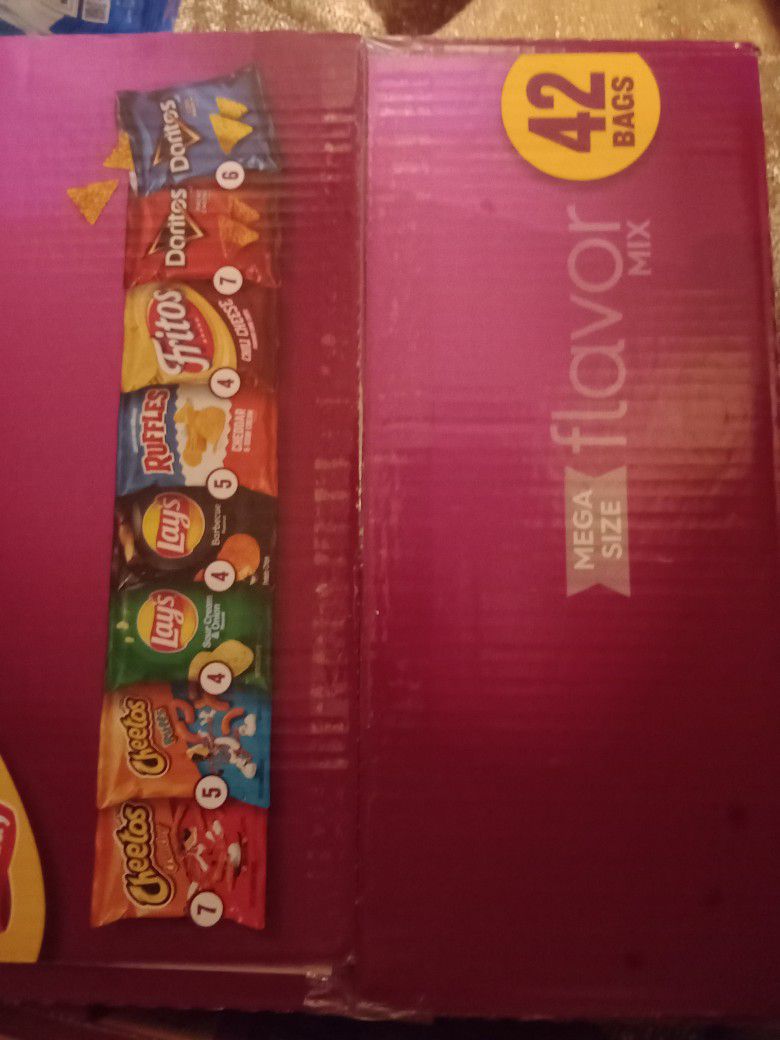 Unopened Boxes Of Different Frito Lay Chips