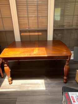 Wooden dining table and 4 chairs