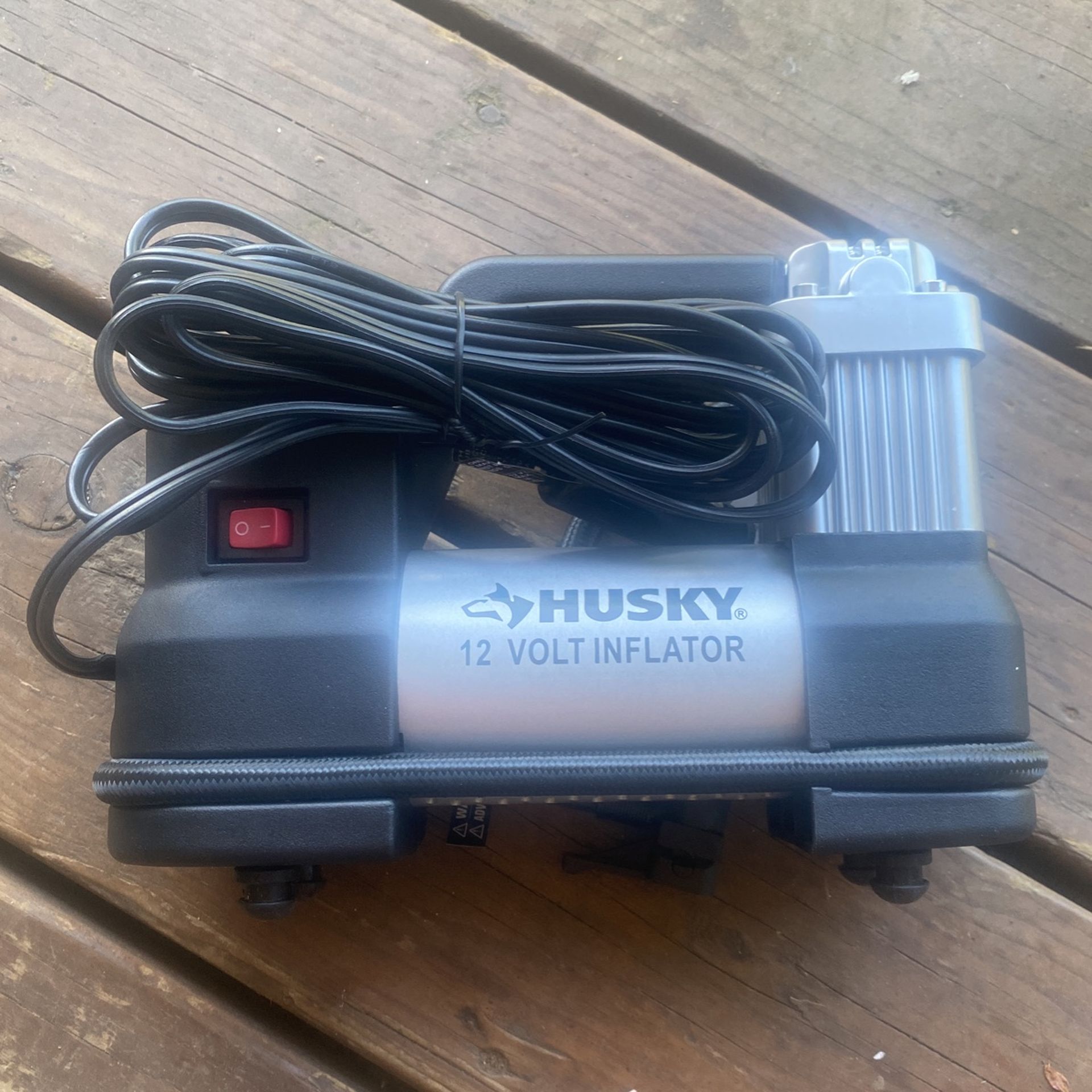 Husky 12 Volt Tire Inflator.   $20.00