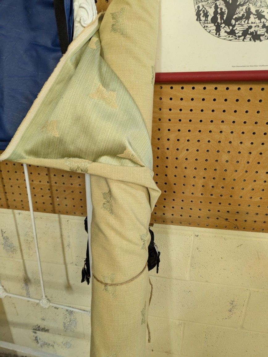 Roll Of Light Green Fabric With Butterfly