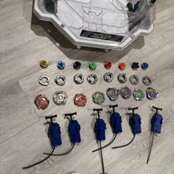 Beyblade Burst Stadium, launchers, and beyblades
