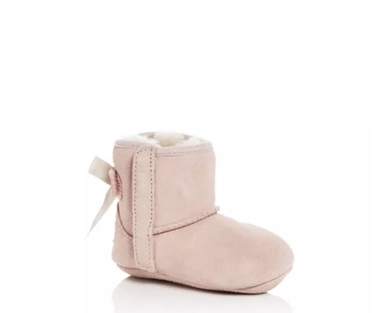 UGG Jesse Bow II Boot  Baby Pink 100% Authentic  size 4/5 (12-18”). Comes with box gently used. Make an offer!