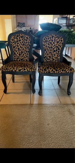 2 Leopard antique chairs