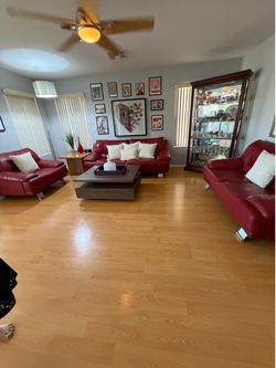 Red leather sofas