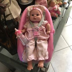 Darling Baby Doll That Laughs  And Drinks Bottle And Blinks Eyes In Baby Carrier  
