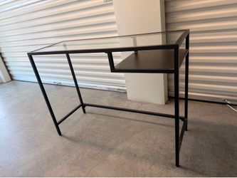 Glass top black frame desk