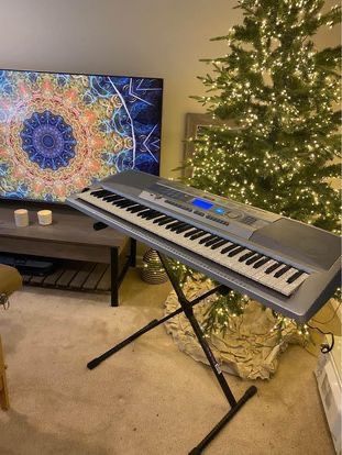 Yamaha Portable Grand 76-Key Electronic Music Keyboard with Portable Stand & Charger