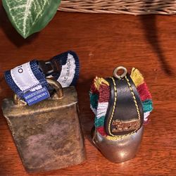 Small cow bells from Europe and one from Vancouver Olympics. 