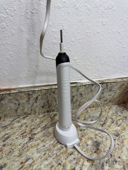 Oral-B Rechargeable Electric Toothbrush + Charger