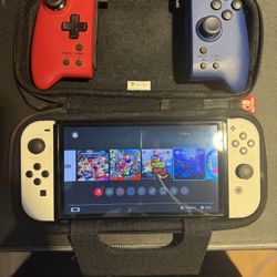 Nintendo switch OLED with case and controllers