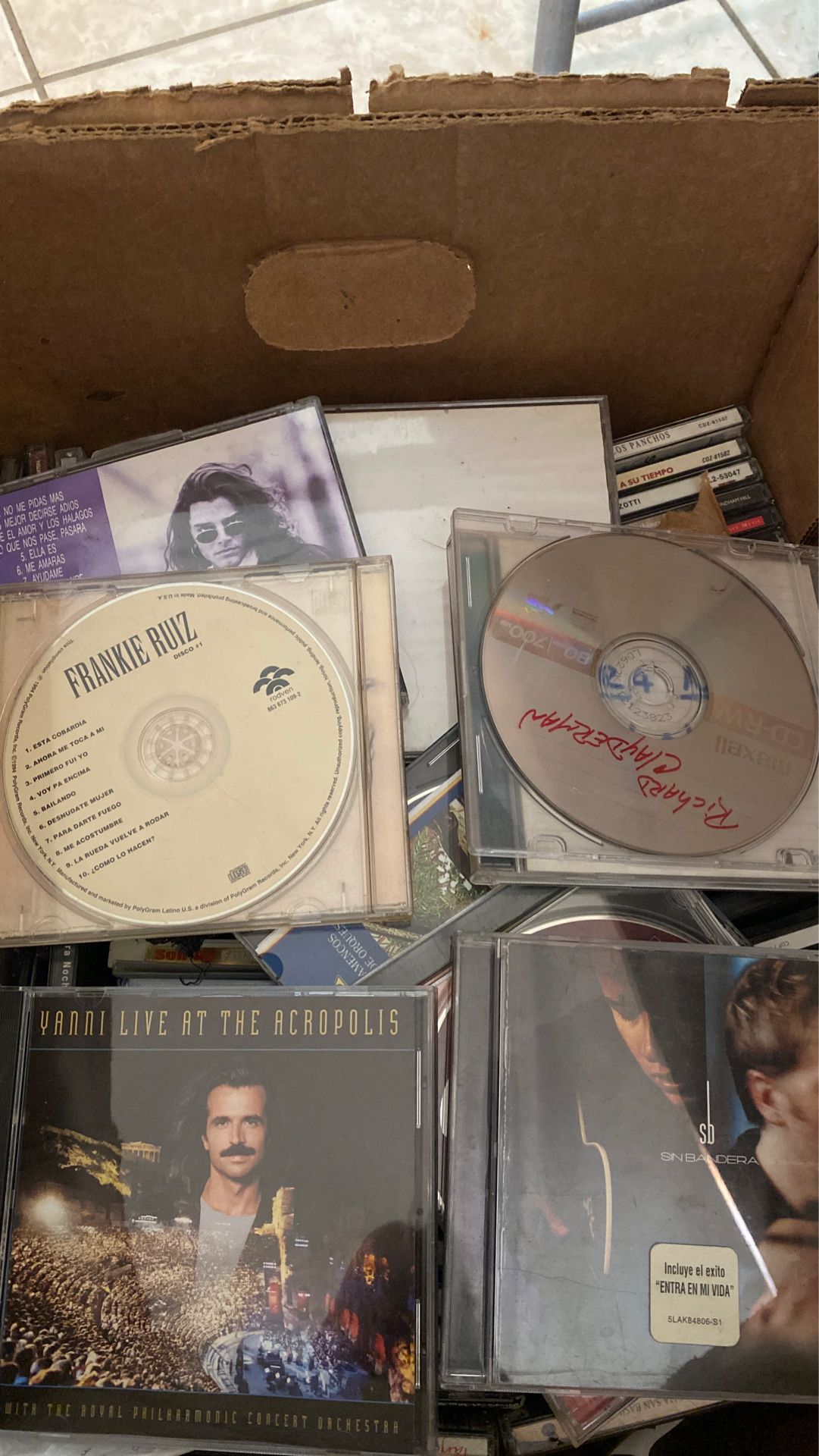 A box of CDs. Latin Music. Too many to list here. $25 for the whole box.