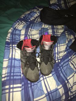 Raptors sz 11 110$ 7.5/10 condition I can remove scuffs before sale