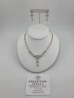 18k gold igi certified vvs diamond necklace and earrings