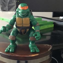 Kids Teenage Mutant Ninja Turtles I don’t have a sword or anything it’s out of the box it’s used it for years might be a collectible it’s got som some