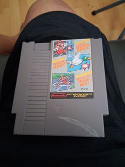 Nintendo game cartridge has  3 games on it super Mario's bros duck hunt and track meet