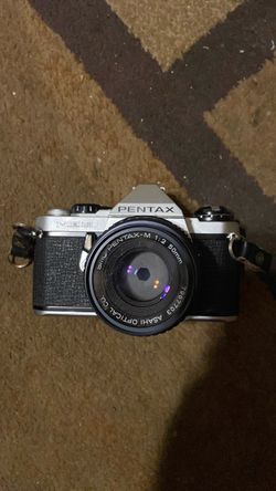 Pentax ME Super 35mm film camera with an SMC Pentax-M 50mm lens