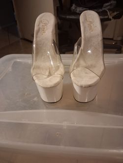 Sleek clear PVC upper with a white platform