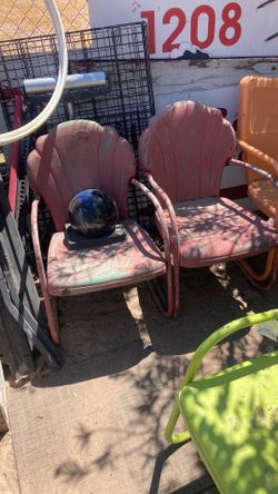 Vintage clamshell back metal motel chairs