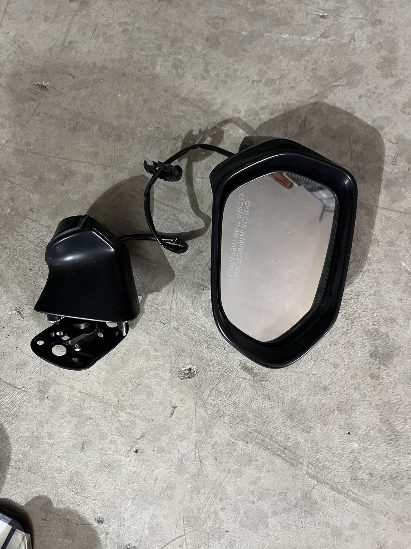 Toyota Corolla passenger side power door mirror.