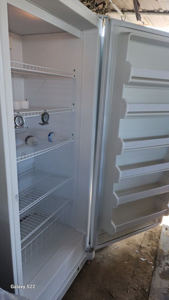 General Electric Freezer 32 By 70 High 