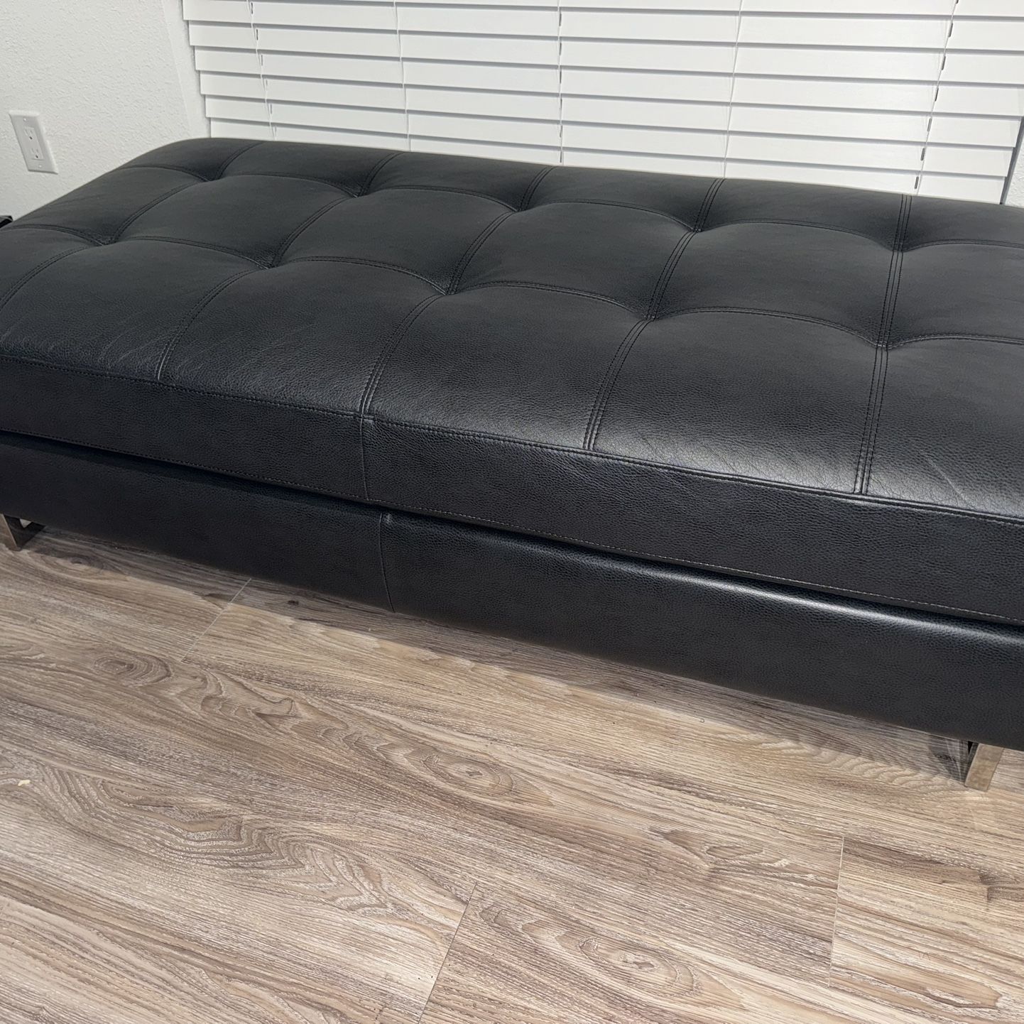 Black leather ottoman 