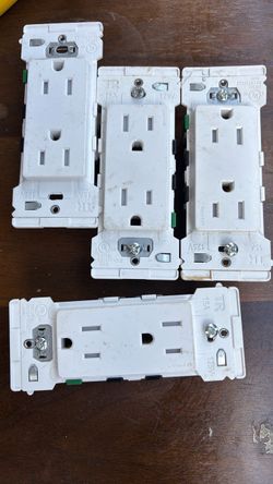 The selected item is a Leviton Decora Edge 15 AmpResistant Duplex Outlet in white.
