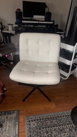 Wide white office chair .. criss crossing sitting