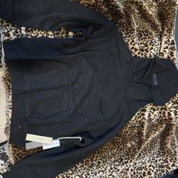 Large Black Fear Of God Essentials hoodie