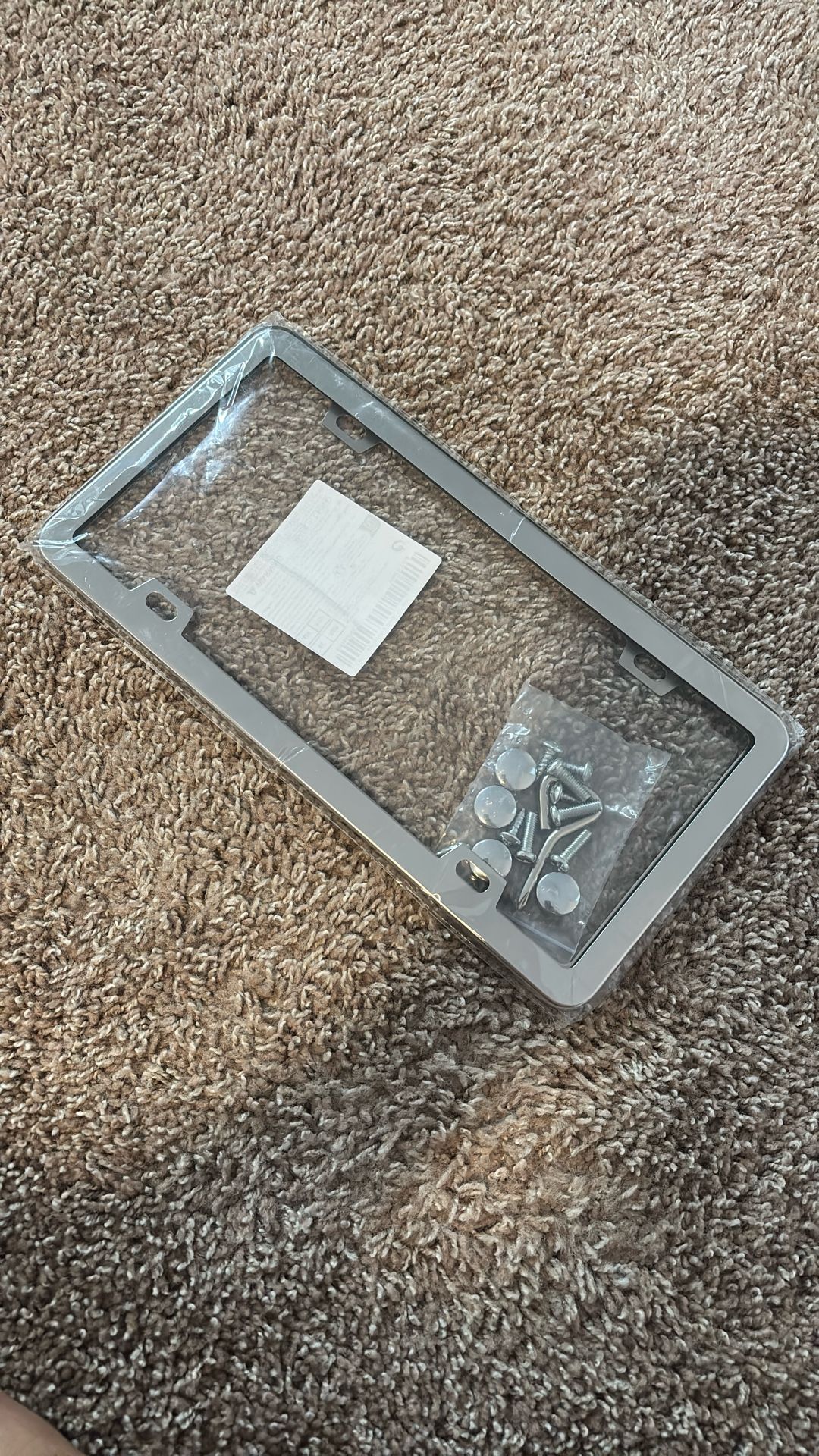 Unopened License Plate Cover