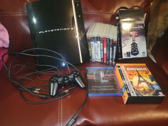 Sony PlayStation 3 "Fat" model console in black, originally released in 2006,  includes a DualShock 3 controller,selling the Bundle includes 11 games,