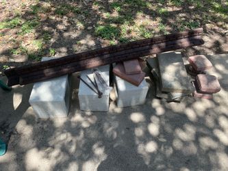 18 misc size concrete blocks for gardening and two edging borders with stakes (new)