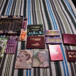 Lot of eye Shadow Palettes And Makeup Brushes