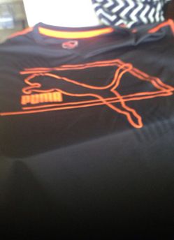 Puma boys shirt. New. Size large.