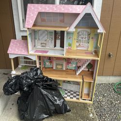 Free Dollhouse And Bag Of Toys