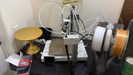 Bambu 3d printer with eight 910 rules of filament each color PLA