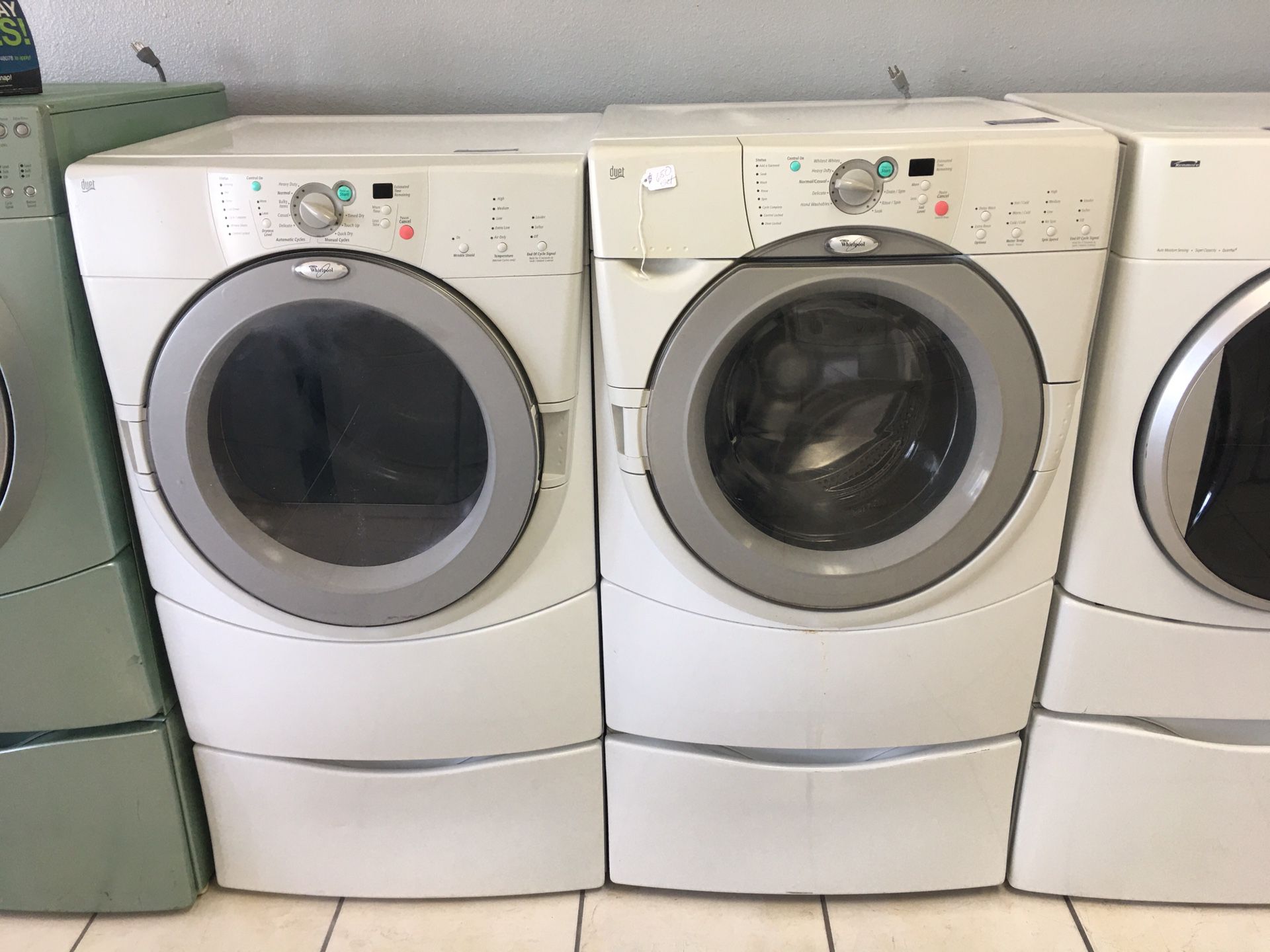 Whirlpool front load washer and dryer set with pedestals