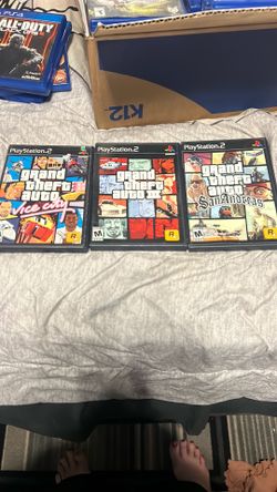 Set of three grand theft autos for a PlayStation two