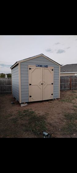 10x12 storage shed included 1 door 2 shelves
