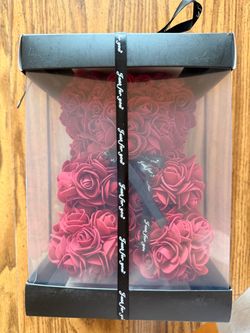 Rose teddy bear in plastic case