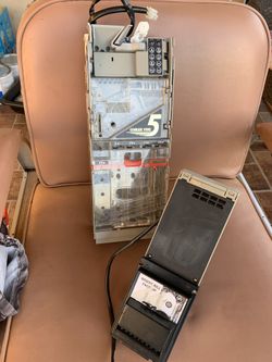 Dollar bill acceptor and changer conlux