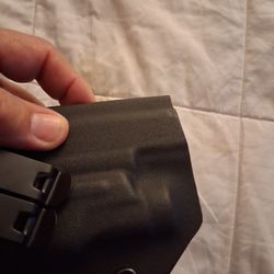 Left handed gun holster