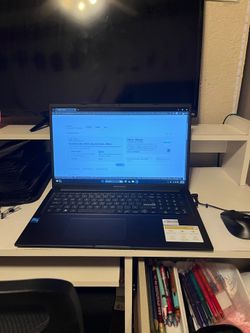 Barely used Asus Vivobook and case