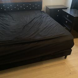 LED king size bed with two nightstands.