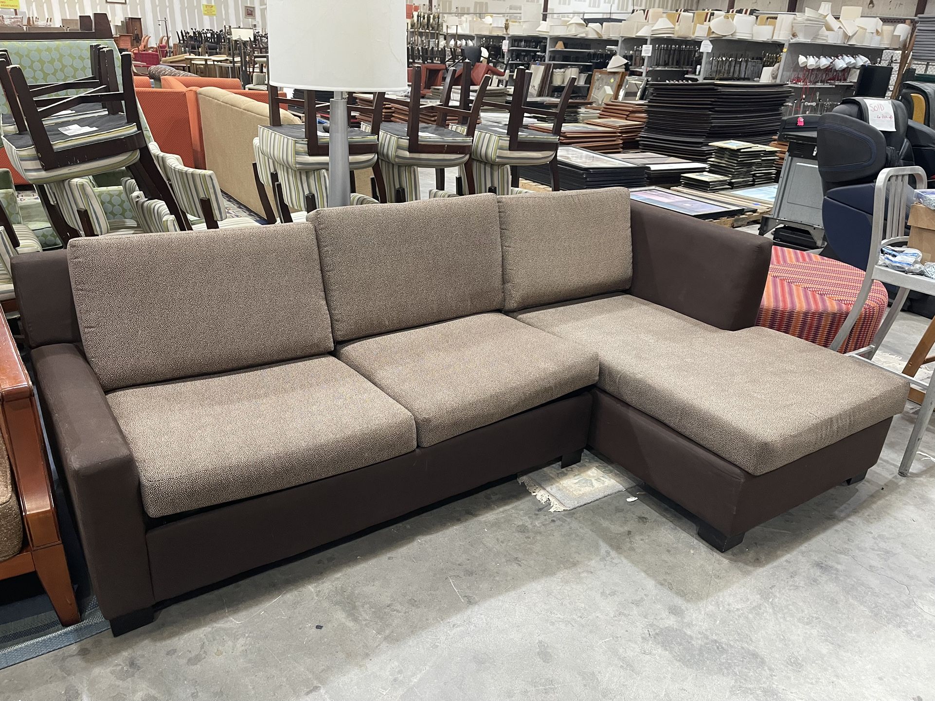 Brown “L Shaped” Sectional With Sleeper Bed