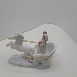 Bride and groom on a horse and carriage party favor/cake topper