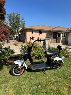 $1200. Free delivery works great has battery charger key everything works straight.