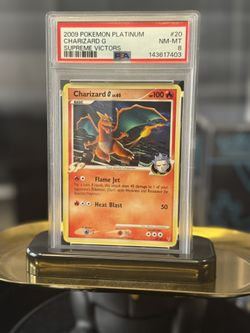 2009 Charizard G 20/147 Supreme Victors Regular Rare - PSA 8