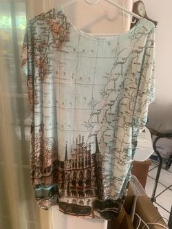 this one looks like a women’s XL Vini graphic/map T-shirt with an Eiffel Tower and rose design.